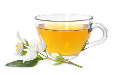 Aromatic jasmine tea in glass cup and flowers isolated on white