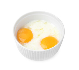 Half-boiled eggs in bowl isolated on white