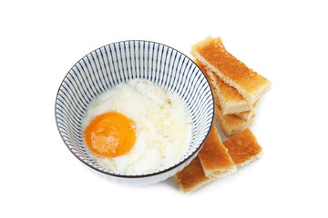 Half-boiled egg in bowl and toasted bread isolated on white
