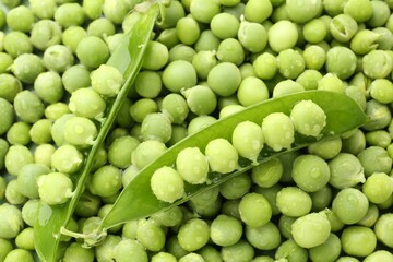 Pile of fresh green peas as background, top view