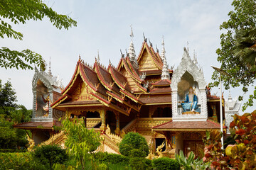 Fototapeta premium Xishuangbanna Grand Buddhist Temple traditional temple architecture scenery