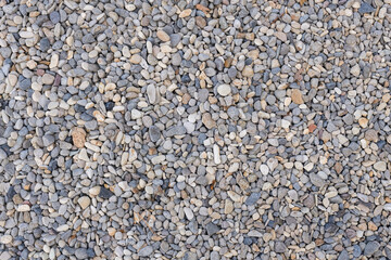 Lots of small grey and black stone floors.