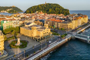 Fototapeta premium Aerial view of San Sebastian cityscape at sunrise in the Basque Country, northern Spain.