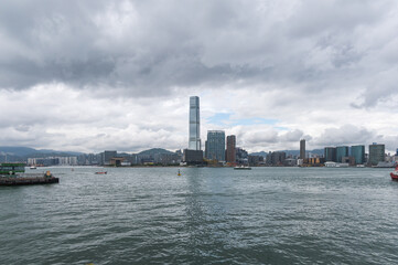 Naklejka premium View of Kowloon from China Merchants Tower on a cloudy day, Hong Kong Island.