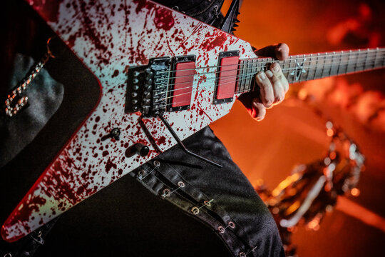 Guitarist playing a solo on an electric guitar