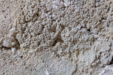 High-resolution Texture of Rough Gray Concrete Surface with Visible Grain, Cracks, and Rugged Details. Perfect for Architectural Backgrounds, Construction Themes, and Industrial Design Elements.