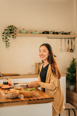 Home cooking scene with a relaxed woman getting ready to make a healthy sandwich, Preparing Fresh Meals at Home