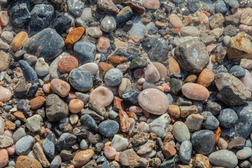 Rocky beach with a lot of rocks scattered around