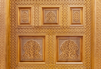 Eastern wooden carvings with beautiful patterns.Handmade on the door.