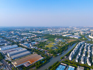 Obraz premium Aerial view of urban scenery in the suburbs, neatly planned factory parks, Qingpu central district, Shanghai.