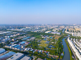 Aerial view of urban scenery in the suburbs, neatly planned factory parks, Qingpu central district, Shanghai.