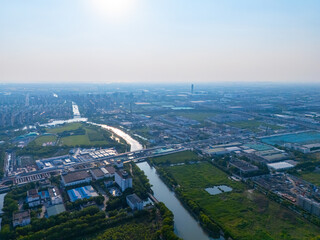 Aerial view of urban scenery in the suburbs, neatly planned factory parks, Qingpu central district, Shanghai.