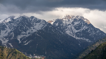 Green Mountains and Dramatic Sky in the Ile-Alatau Range