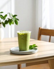 Iced matcha latte on tray in soft light, clean wooden table, beige backdrop, minimalist café vibe.