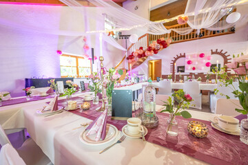 Wedding decor. Close up of a wedding table decoration with white and pink flowers and candles Wedding floristic concept