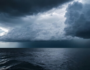 Obraz premium Dramatic cloudy sky over a dark stormy sea, storm clouds over the sea