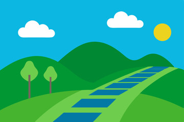 Obraz premium Green nature landscape with a road winding through mountains under a cloudy blue sky