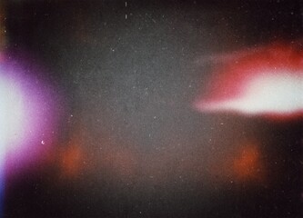 Old film texture with scratches, noise and light leaks. Realistic light leaks overlay film texture in multicolor, dust and grain. Distressed retro movie or photo negative effect of cinema nostalgia