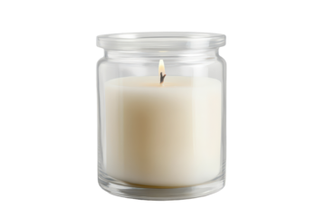 White pillar candle in clear glass jar creating a warm ambiance in a minimalist setting for relaxation or decor