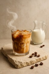 Iced coffee with milk and coffee beans on a stone coaster
