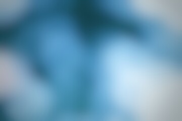 Serene aquatic blur of blue and white tones evokes peaceful depths