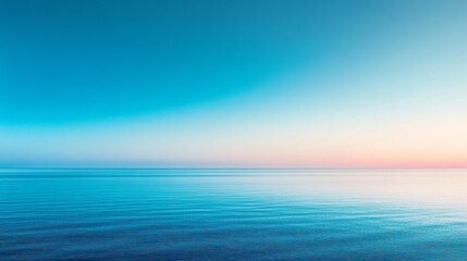 Obraz premium Tranquil Expanse of Vibrant Blue Water and Serene Sky at Dusk