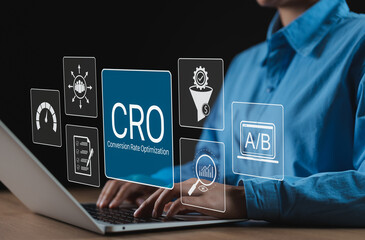 CRO Conversion Rate Optimization Technology Concept. Woman using laptop with icons representing...