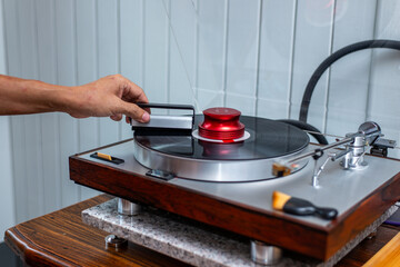 Cleaning Vinyl Record on Vintage Turntable