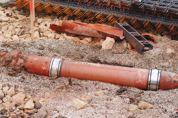 Fast response repair team builders replacing damaged foul sewer drainage pipe
