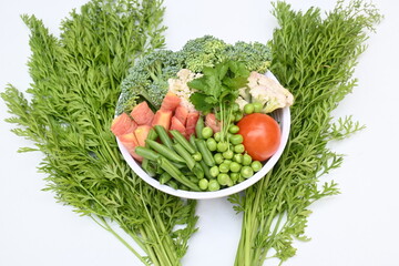 Vibrant medley of fresh vegetables. Features broccoli, cauliflower, tomatoes, Carrot, green beans, and peas. colourful vegetables of spring time, Its good for health. colorful display.