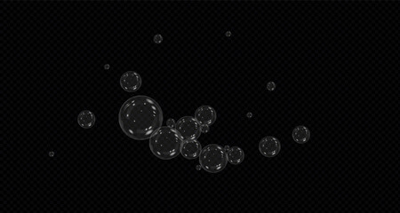 A set of colourful soap bubbles for creating designs. Isolated, transparent, realistic soap bubbles on a black background. Bubble,bulbashka. PNG