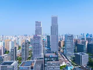Aerial view of Shanghai skyscraper in downtown with blue sky background.