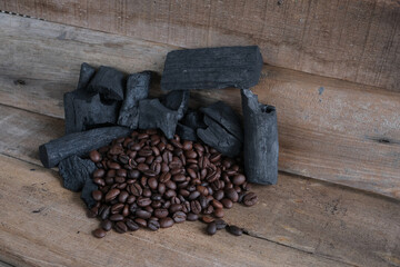 Coffee beans on a wooden background