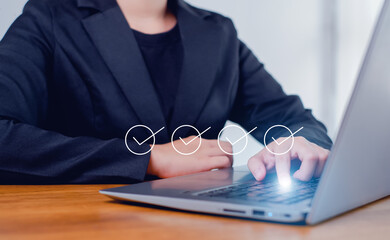 Businesswoman mark checkboxes, Survey form, check marks on checklist,Checklist concept.
