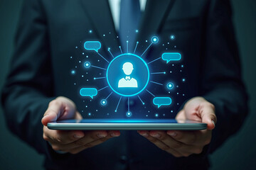 Businessman holding tablet with ai agent chatbot and digital interface technology