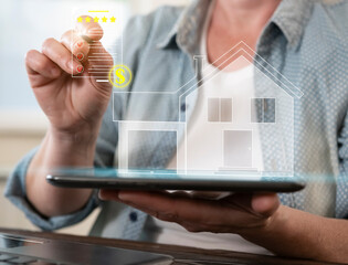 Person using digital tablet to assess property value and real estate features while interacting...