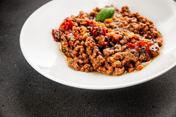 Lentil dish vegetables and roasted peppers savory vegetable fresh vegetarian and vegan food gourmet food background on the table rustic food top view copy space keto and paleo diet