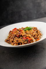 Lentil dish vegetables and roasted peppers savory vegetable fresh vegetarian and vegan food gourmet food background on the table rustic food top view copy space keto and paleo diet