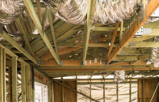 Residential building extension showing air conditioning ducts, timber framing and wall linings