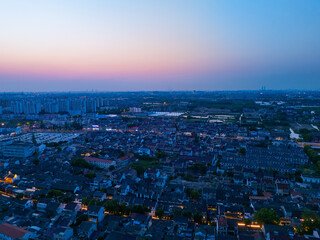 Aerial view of Shanghai Xinchang Ancient Town at sunset, One of the most famous ancient towns in Shanghai.