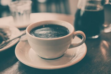 Dark Roast Coffee in a Rustic Cafe: A Nostalgic Moment