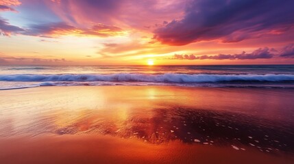 Fototapeta premium A peaceful empty beach scene at sunset, vibrant orange and purple skies reflecting on wet sand and tranquil waves.