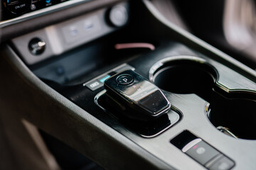Automatic transmission shift selector in the car interior. Close-up of a manual gearshift of a modern car.