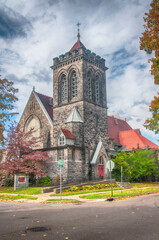 The Christ Episcopal church in autumn on a Corning New York street corner