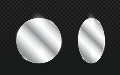 Two sleek, highly reflective silver shapes, one circular and one oval, showcase a glossy metallic finish with dynamic highlights. Set against a transparent background, these versatile 3D elements