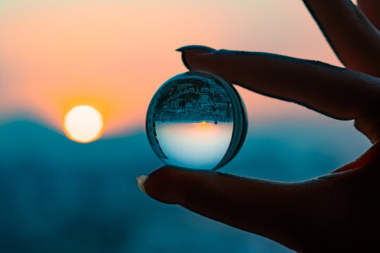 Crystal Ball Sunset Reflection. Inverted Cityscape at Golden Hour - Powered by Adobe