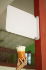 Closeup of Iced Caramel Macchiato at the coffee shop, Caramel Macchiato is a classic macchiato...