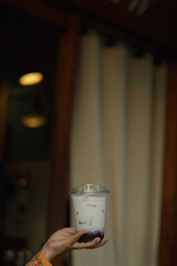 Closeup of Iced Caramel Macchiato at the coffee shop, Caramel Macchiato is a classic macchiato...