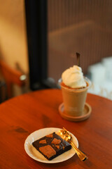 Closeup of Iced Caramel Macchiato at the coffee shop, Caramel Macchiato is a classic macchiato...