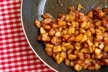 Homemade apple pie filling in a pan